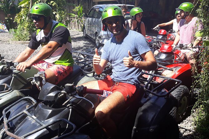 Bali ATV Rafting And Ubud Waterfall Private Tour - Stop 1: ATV adventure through rice fields, mud routes, and jungle paths