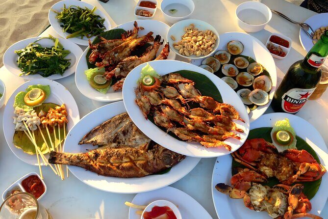 Bali Cycling and Uluwatu Tour Packages - Jimbaran seafood dinner on the sand