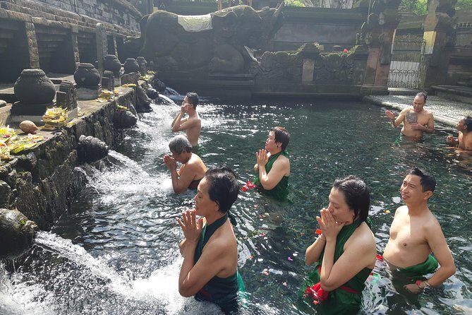 Bali Full Day Holy Water Tour - Stop 1: Tegenungan Waterfall, views up top and a real splash down below