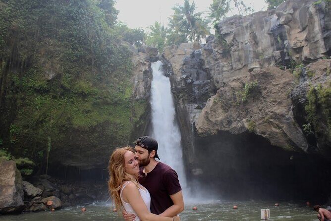 Bali Private Full Day Tour to Visit the Best Waterfalls and Swing near Ubud - Stop 2: Kanto Lampo for a smaller waterfall vibe