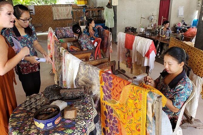 Best Bali Ubud Full Day All-Inclusive Private Tour - Pura Puseh Desa Batuan: carved stone and sarongs on
