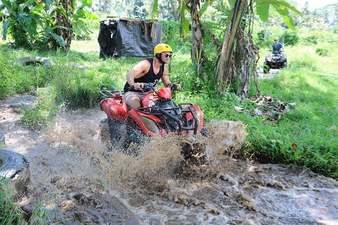 Full-Day Bali Adventure Tour with Quad Bikes and Rafting - ATV Time: Rice Fields, Jungle Tracks, and Village Views