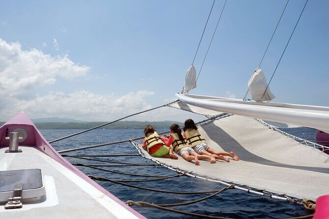 Full day Lembongan Island Catamaran Cruise with BBQ Lunch - Snorkeling and Reef Time: Clear Water, Fish Feeding, and Choppy-Water Reality