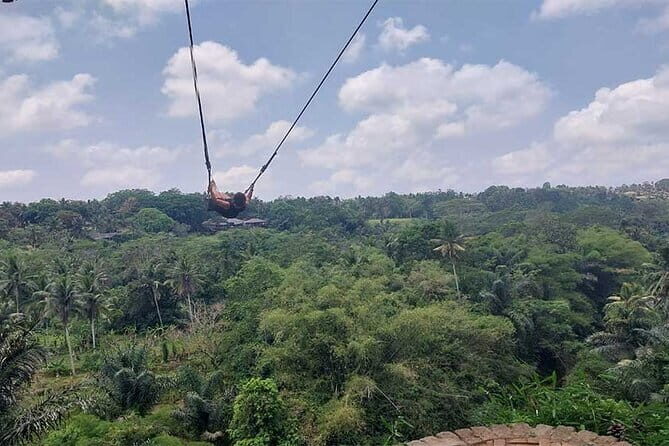 Full Day Private Tour from Tegenungan Waterfall to Tanah Lot - Tegenungan Waterfall: swim access, elevator return, and the restaurant setup