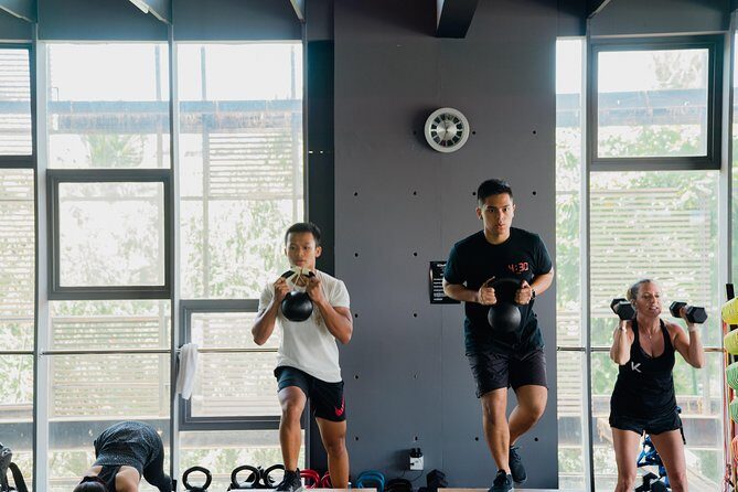 Group Fitness Classes and Open Gym - The day’s workout mix: functional training, boxing, and strength