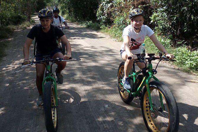 Kuta Beach eBike Private Tour - Side streets, sea views, and the mangrove defense story