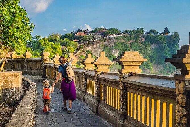 Private Tour Bali Beaches and Uluwatu Temple with Dinner - Padang Padang Beach: Movie-Famous Rocks and Real Beach Time